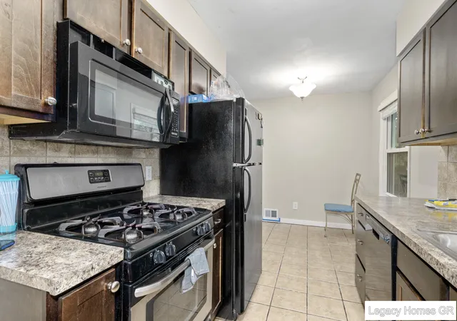 Photo 3 of Single family home for sale at 4250 Illinois Ave SW, Wyoming, MI 49509 | MLS# 65026033989 | Listing updated on 2026-09-18
