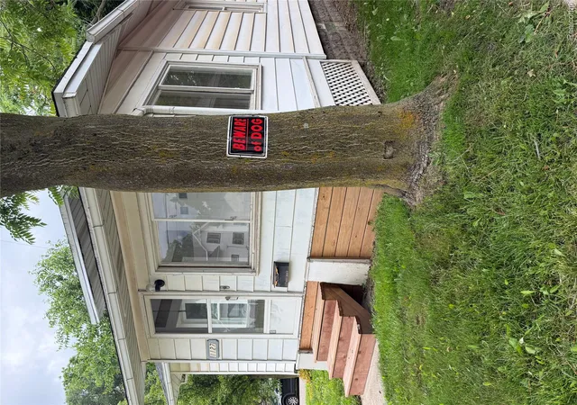 Photo 2 of Single family home for sale at 1127 N Martin Luther King Jr Blvd, Lansing, MI 48915 | MLS# 20261052157 | Listing updated on 2026-07-19