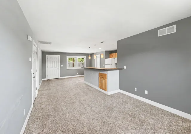 Photo 3 of Multi family home for sale at 823 Benson Ave Ne, Grand Rapids, MI 49503 | MLS# 65026034603 | Listing updated on 2026-10-06