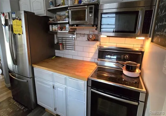 Photo 3 of Single family home for sale at 1414 Earlmoor Blvd, Flint, MI 48506 | MLS# 20261052481 | Listing updated on 2026-07-10