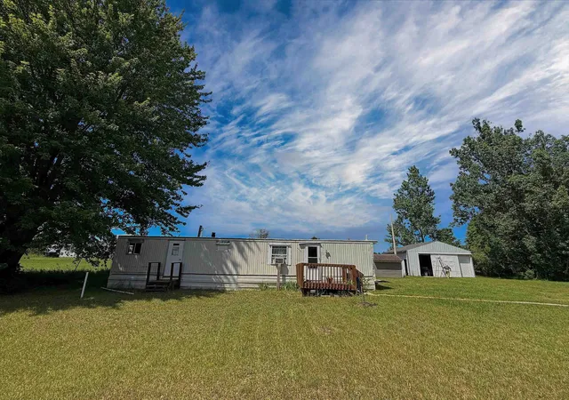 Photo 1 of Single family home for sale at 1395 E Duck Lake Rd, Grawn, MI 49637 | MLS# 78080070922 | Listing updated on 2026-07-13