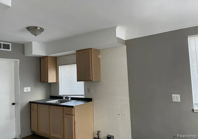 Photo 3 of Single family home for sale at 8909 Burt Rd, Detroit, MI 48228 | MLS# 20261053088 | Listing updated on 2026-09-09