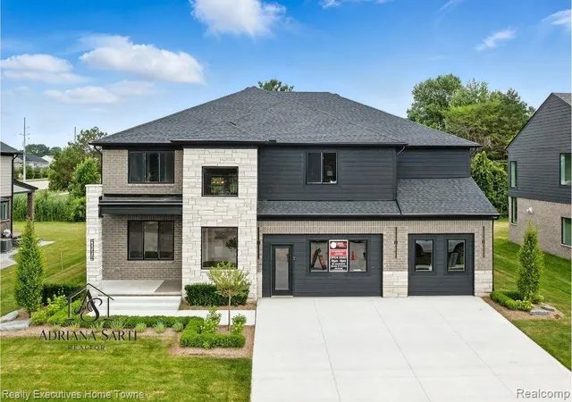 Photo 1 of Single family home for sale at 50931 Mistwood Dr, Macomb, MI 48042 | MLS# 20261053551 | Listing updated on 2026-07-14