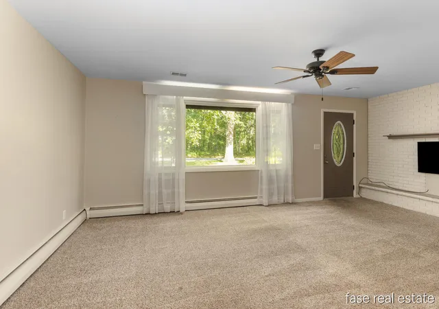 Photo 3 of Single family home for sale at 7676 Courtland Dr NE, Rockford, MI 49341 | MLS# 65026035792 | Listing updated on 2026-07-21
