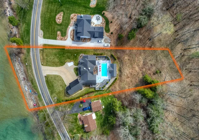 Photo 2 of Single family home for sale at 6885 E Shore Rd, Traverse City, MI 49686 | MLS# 78080071048 | Listing updated on 2026-08-05