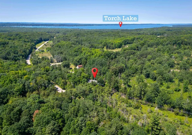 Photo 3 of Single family home for sale at 4724 Plum Valley Rd Nw, Rapid City, MI 49676 | MLS# 78080071173 | Listing updated on 2026-09-16
