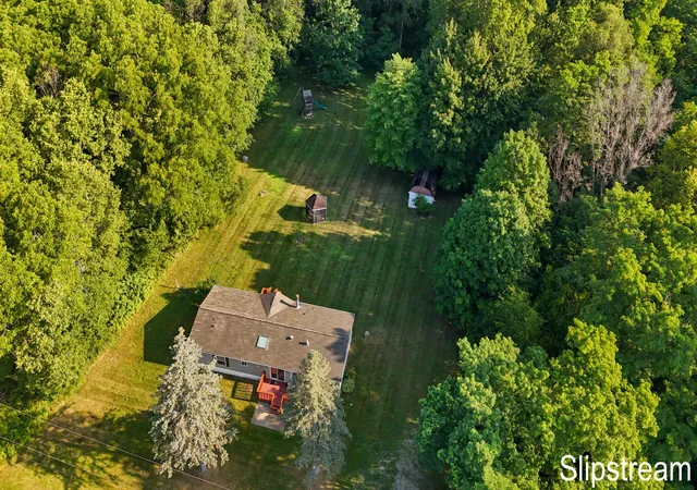 Photo 1 of Single family home for sale at 5705 E Riverside Dr, Lyons, MI 48851 | MLS# 65026036745 | Listing updated on 2026-09-30
