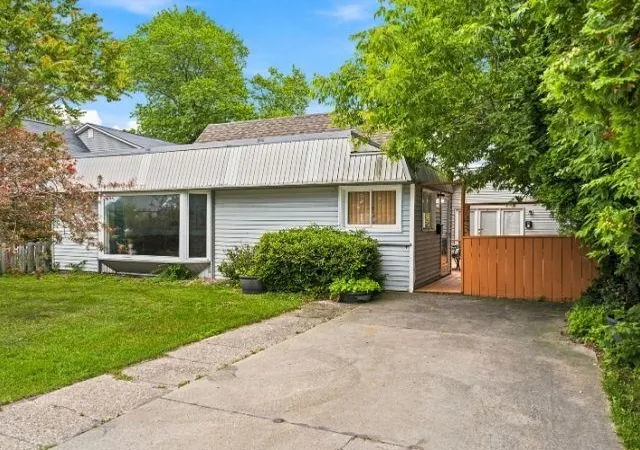 3rd image of 143 S Benzie Blvd, Beulah, MI 49617 | MLS# 78080071215