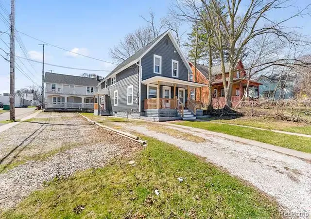 1st image of 119 Moores River Dr, Lansing, MI 48910 | MLS# 20261056325