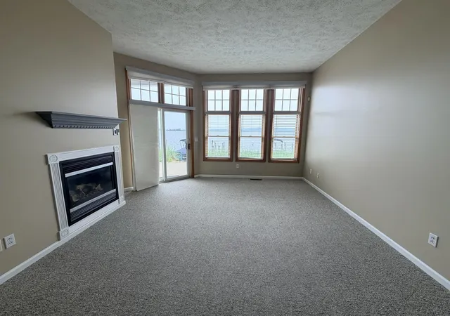 Listing Photo 5 - Condo for sale in building located at 45 Arthur St, Manistee, MI 49660