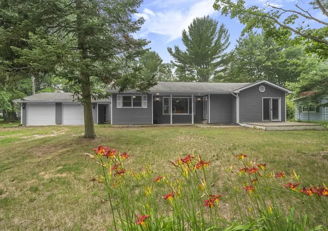 1st image of 6586 Betsie River Rd, Interlochen, MI 49643 | MLS# 78080071412