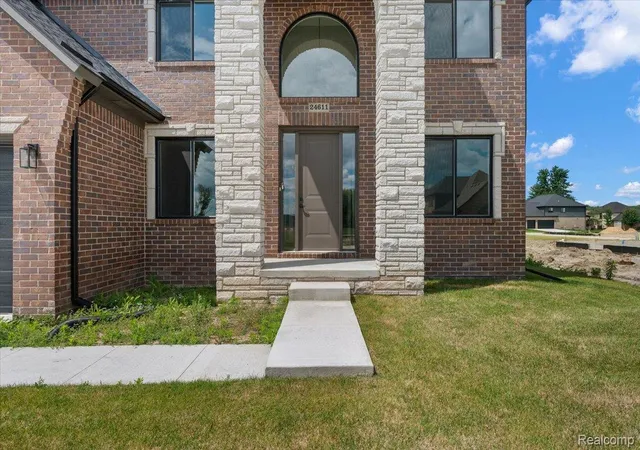 Photo 3 of Single family home for sale at 24611 Tribute Dr, Macomb, MI 48042 | MLS# 20261057691 | Listing updated on 2026-08-28