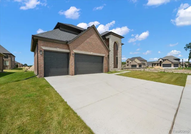 Photo 3 of Single family home for sale at 24611 Tribute Dr, Macomb, MI 48042 | MLS# 20261057691 | Listing updated on 2026-10-04