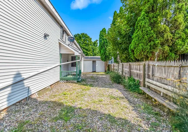 Photo 3 of Multi family home for sale at 118 W Chicago Rd, Allen, MI 49227 | MLS# 53026038619 | Listing updated on 2026-09-08