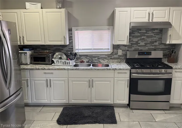Photo 3 of Single family home for sale at 14203 Hubbell St, Detroit, MI 48227 | MLS# 20261058221 | Listing updated on 2026-08-09