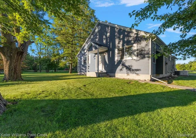 3rd image of 54230 Card Rd, Macomb, MI 48042 | MLS# 20261059180
