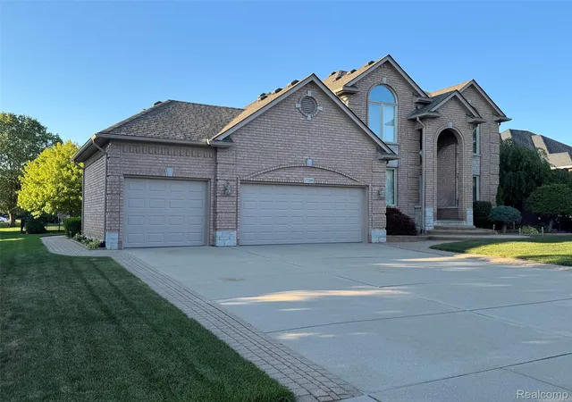 Photo 2 of Single family home for sale at 17209 Invitational Dr, Macomb, MI 48042 | MLS# 20261059200 | Listing updated on 2026-08-28