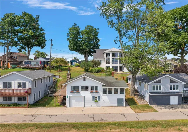 1st image of 6444 Lakeshore Dr, Saranac, MI 48881 | MLS# 65026039399