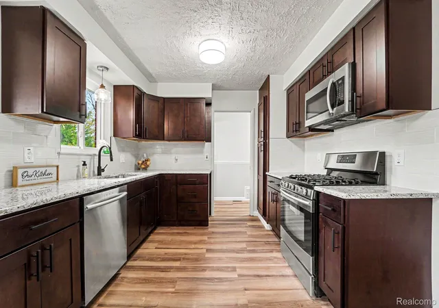 Photo 2 of Single family home for sale at 12922 E 13 Mile Rd, Warren, MI 48088 | MLS# 20261059713 | Listing updated on 2026-09-11