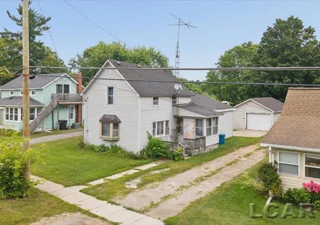Photo 1 of Single family home for sale at 215 Woodstock St, Cement City, MI 49233 | MLS# 56050217315 | Listing updated on 2026-08-04