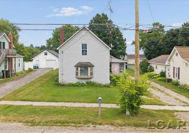 Photo 2 of Single family home for sale at 215 Woodstock St, Cement City, MI 49233 | MLS# 56050217315 | Listing updated on 2026-08-04