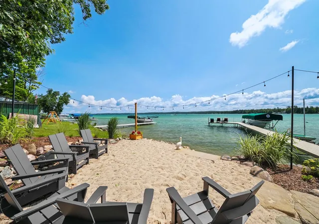 1st image of 12344 S West Torch Lake Dr, Rapid City, MI 49676 | MLS# 78080071911