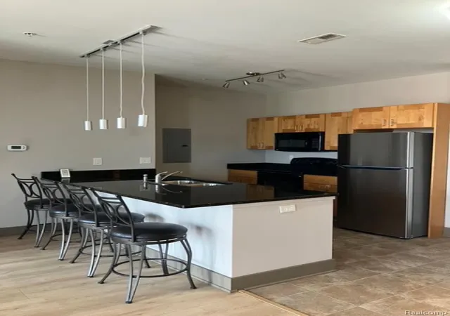3rd image of 500 E Michigan Ave #401, Lansing, MI 48912 | MLS# 20261061521