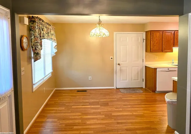Listing Photo 4 - Condo for sale in building located at 23597 Suttons Bay Dr, Clinton Township, MI 48036