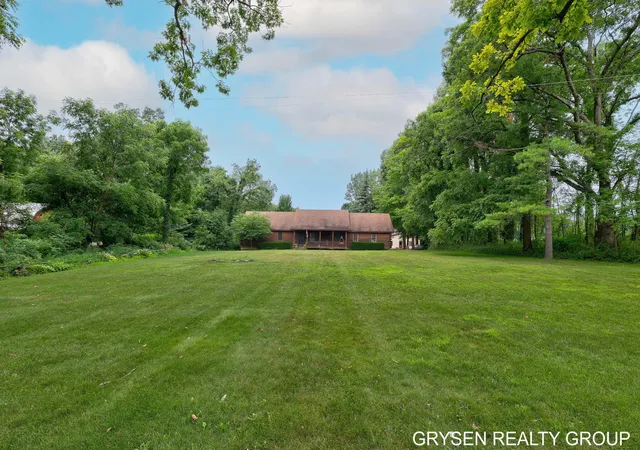1st image of 13815 Cypress Ave, Sand Lake, MI 49343 | MLS# 65026041044