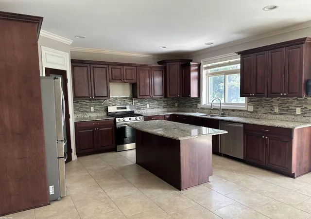 3rd image of 52628 Harmony Dr, Macomb, MI 48042 | MLS# 58050217756