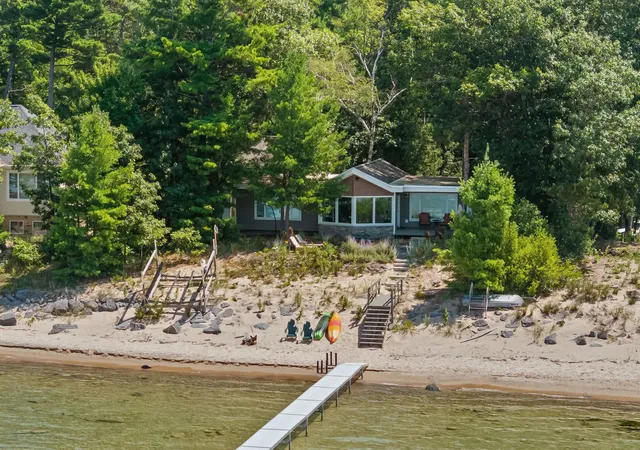 1st image of 10892 Lakeshore Rd, Williamsburg, MI 49690 | MLS# 78080072078