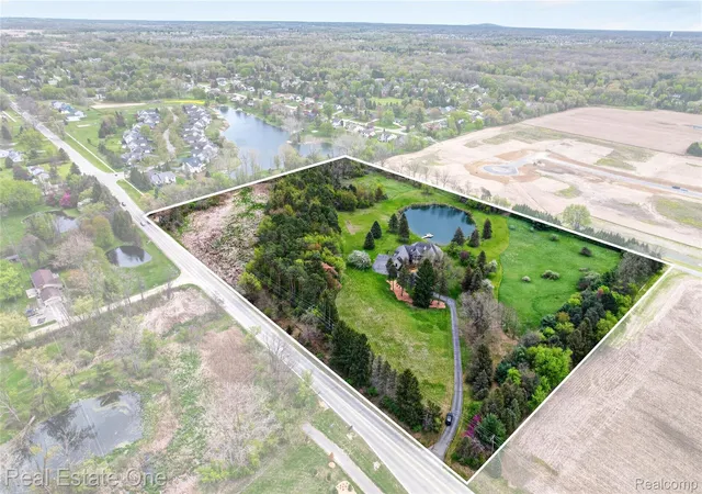 1st image of 60675 Pontiac Trl, New Hudson, MI 48165 | MLS# 20261062585