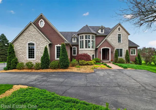 2nd image of 60675 Pontiac Trl, New Hudson, MI 48165 | MLS# 20261062585