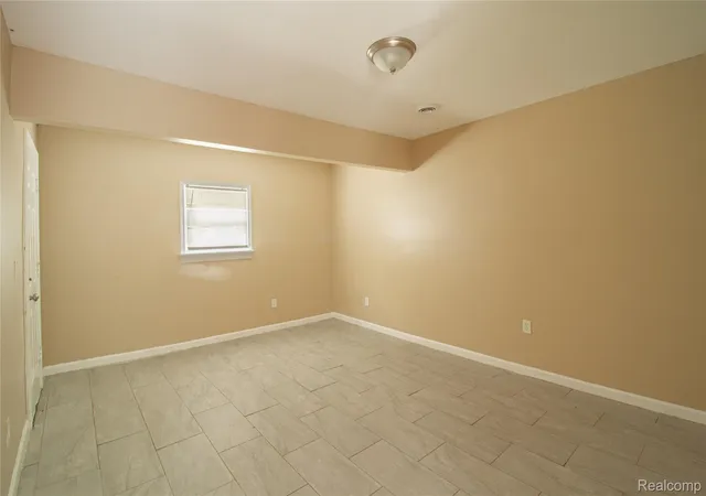 Photo 4 of Single family home for sale at 14874 Dolphin St, Detroit, MI 48223 | MLS# 20261063198 | Listing updated on 2026-09-23