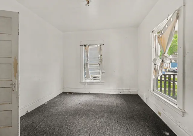Photo 4 of Multi family home for sale at 106 Stewart St SW, Grand Rapids, MI 49507 | MLS# 71026042678 | Listing updated on 2026-09-04