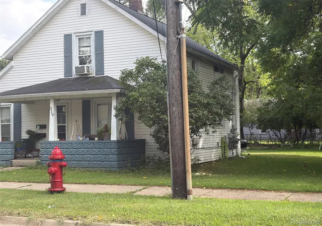 Photo 1 of Multi family home for sale at 319 1st Street, Rochester, MI 48307 | MLS# 20261064738 | Listing updated on 2026-08-24
