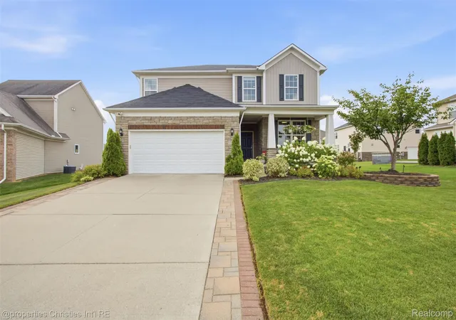 2nd image of 57909 Cider Mill Dr, New Hudson, MI 48165 | MLS# 20261064999