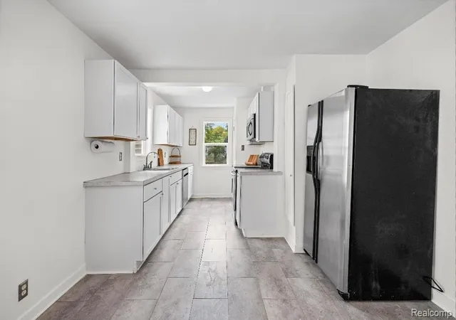 Photo 3 of Single family home for sale at 1305 Huron St, Flint, MI 48507 | MLS# 20261065363 | Listing updated on 2026-09-15