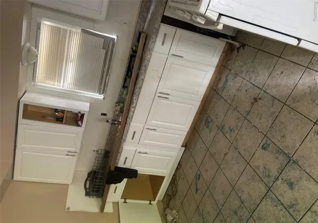 Photo 4 of Single family home for sale at 2465 Court St, Flint, MI 48503 | MLS# 20261065518 | Listing updated on 2026-09-02