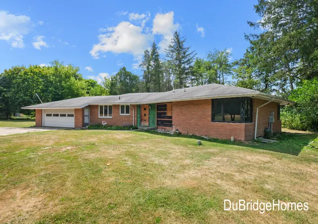 1st image of 311 Honey Creek Ave Se, Ada, MI 49301 | MLS# 65026043398