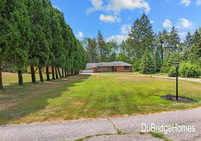 3rd image of 311 Honey Creek Ave Se, Ada, MI 49301 | MLS# 65026043398