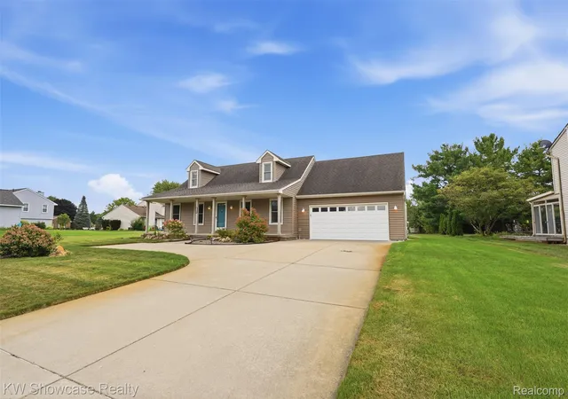 1st image of 59563 Barkley Dr, New Hudson, MI 48165 | MLS# 20261066286