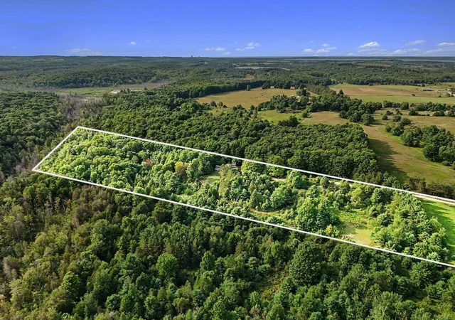 48th image of 715 Sequanota, East Jordan, MI 49727 | MLS# 78080072571
