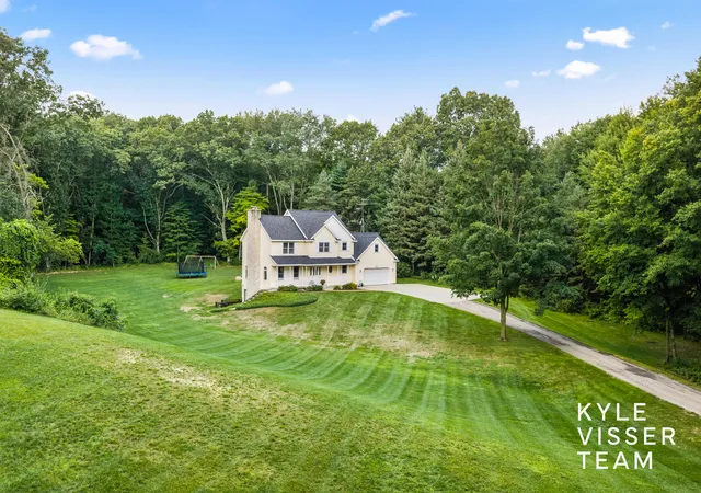 1st image of 1873 Grand River Dr Ne, Ada, MI 49301 | MLS# 65026043990
