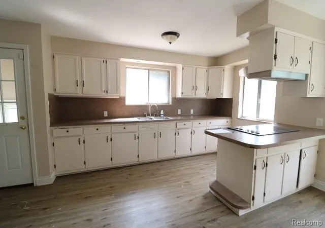Photo 2 of Single family home for sale at 1609 E Court St, Flint City Genesee, MI 48503 | MLS# 20261067986 | Listing updated on 2026-09-03