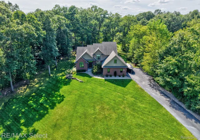 Photo 2 of Single family home for sale at 105 Lake Pines Dr, Hartland Township Livingston, MI 48114 | MLS# 20261068018 | Listing updated on 2026-09-27
