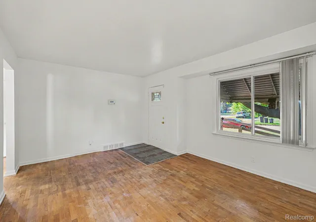 Photo 3 of Single family home for sale at 1210 Simca St, Flint Charter Township Genesee, MI 48507 | MLS# 20261069061 | Listing updated on 2026-09-02