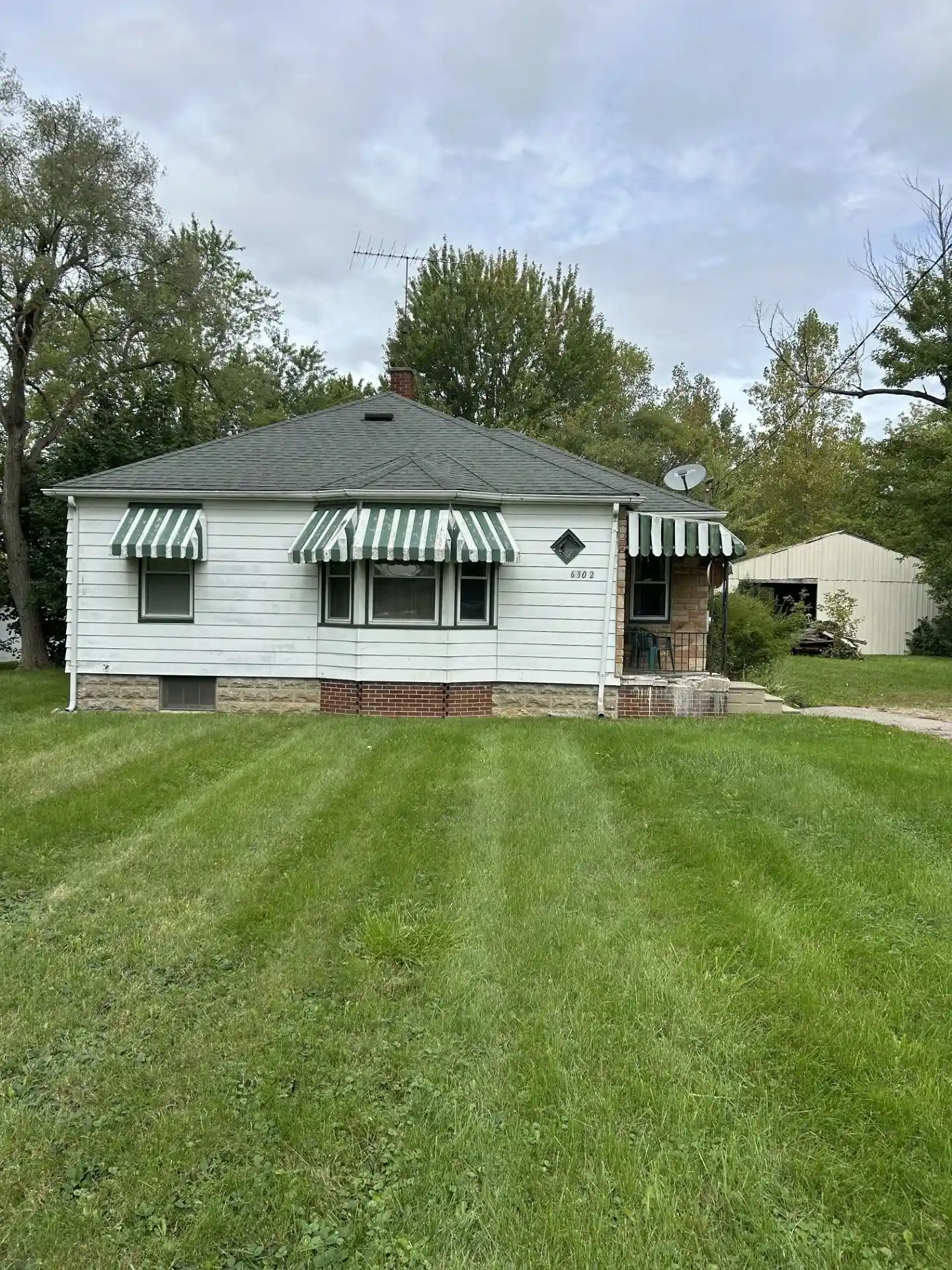 Photo 1 of Single family home for sale at 6302 Corunna Rd, Flint, MI 48532 | MLS# 5050222942 | Listing updated on 2026-09-25