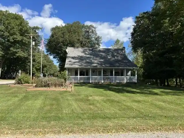 Single family home for sale at 210 Woodward Ave, Tawas City, MI 48763 | MLS# 77080074520