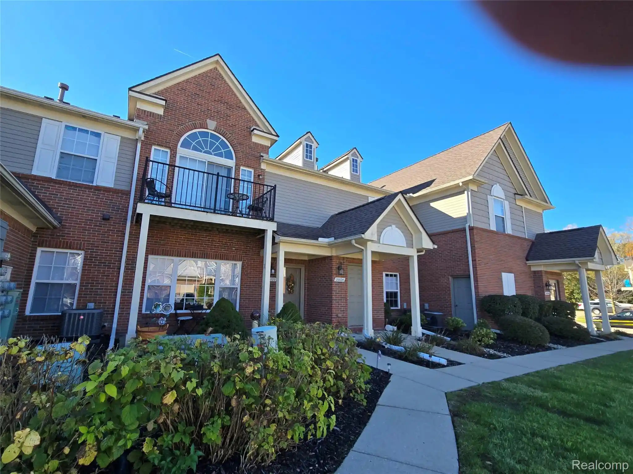 Listing Photo 1 - Condo for sale in 20024 Hidden Oaks Dr located at 20024 Hidden Oaks Dr, Trenton, MI 48183 - Unit 20024 Hidden Oaks Dr